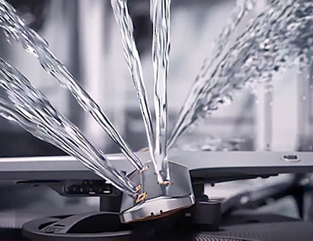 LG dishwasher with multiple powerful water jets in the center, providing thorough cleaning for all dishes.